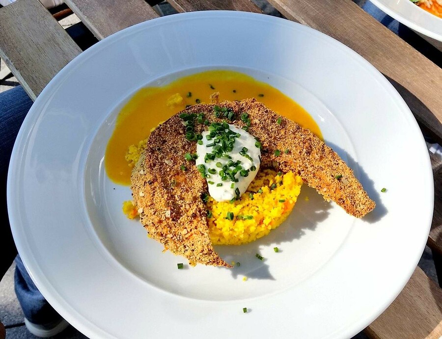 Breaded squash on a bed of pumpkin soup