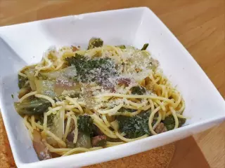 Swiss chard fondue with bacon bits