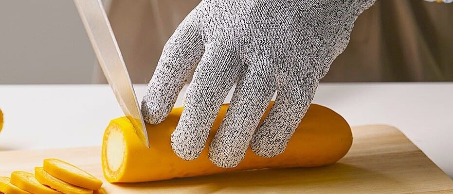 What is the purpose of a cut-resistant glove in the kitchen?