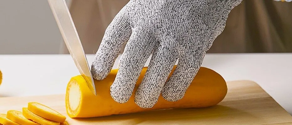 What is the purpose of a cut-resistant glove in the kitchen?