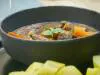Sautéed veal with carrots, served with a spiced wine sauce